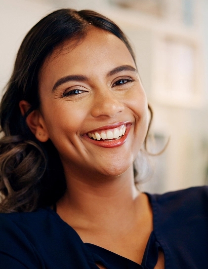 a young girl very happy after receiving Emergency Dental care in Culver City CA