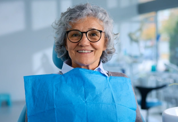 a older women ready to take tooth cleaning
