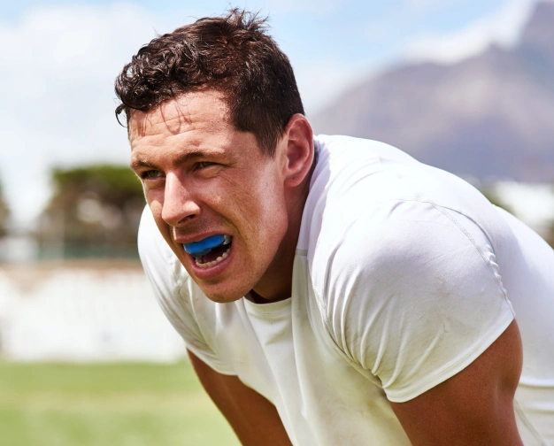 a athletic wear mouth guards during his sports times