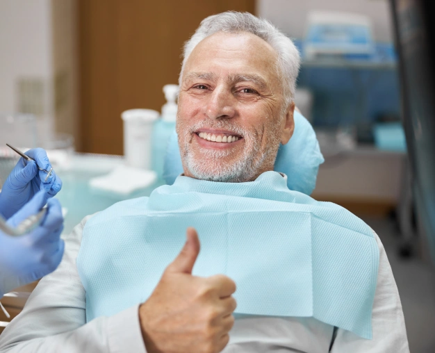 a older man ready to receiving periodontal treatment in Culver City
