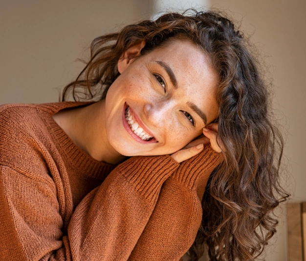 a beautiful girl smiling after received teeth whitening treatment in Culver City